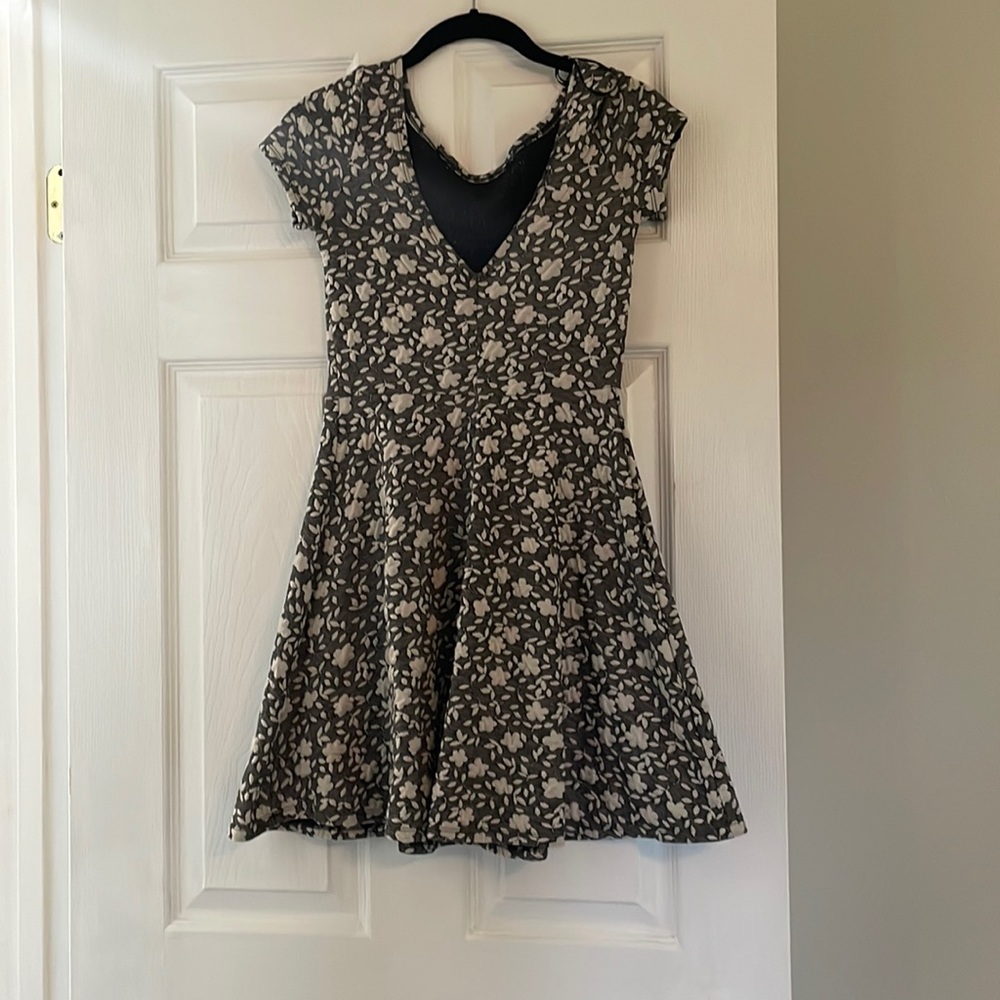Small grey and white floral woman’s dress.